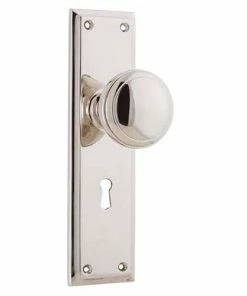 TRADCO MILTON DOOR KNOB ON PLATE